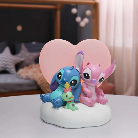 Figura iluminada enesco disney stitch y angel