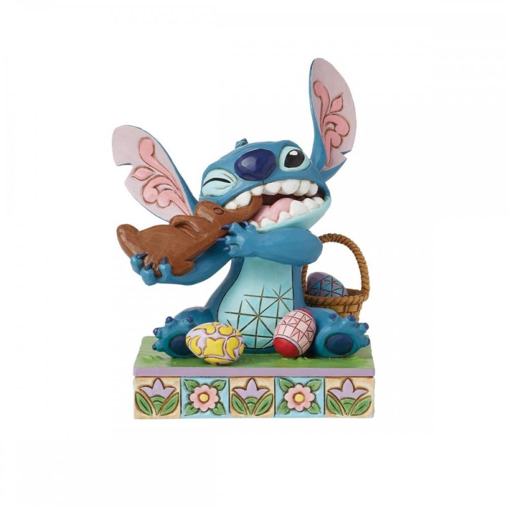 Figura enesco diseny stitch comiendo conejo de chocolate con huevos